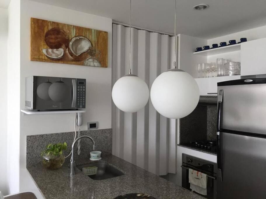 Hermoso Apartamento: Beachfront Comfort With Direct Access