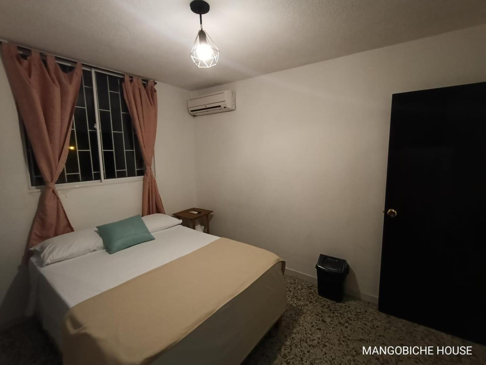 Mango Biche - House