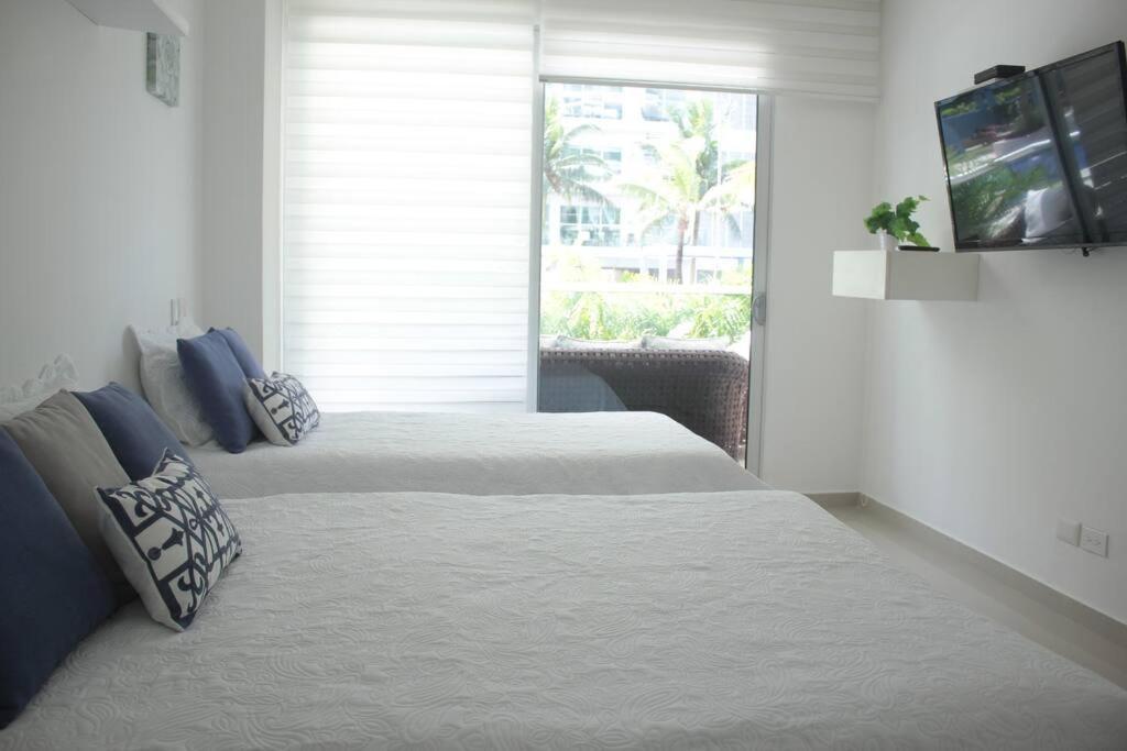 Apartamento Beachfront Bliss-2br Haven Steps From Sandy Shores